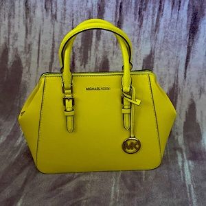 Brand new yellow never used Michael Kors purse